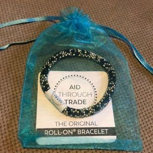 NWT Aid Through Trade Original Roll-On Bracelet